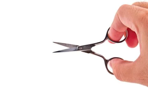 Scissors in hand isolated on white background Stock Photos