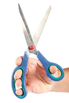 Scissors in hand on white background. Stock Photos