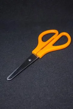 Scissors isolated on black background Stock Photos