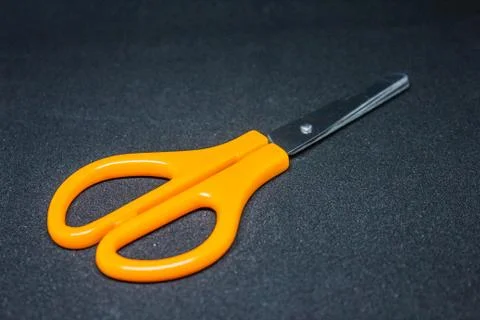 Scissors isolated on black background Stock Photos