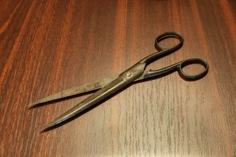 Scissors on table Stock Photos