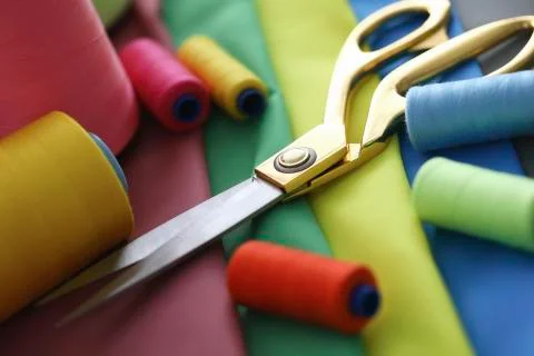 Scissors thread fabric sewing lie on table business Stock Photos