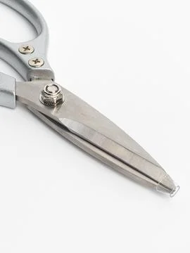 Scissors on white background, angled view Stock Photos
