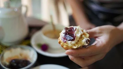 Scone in a hand Stock Photos