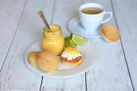 Scone with lemon Kurd Stock Photos