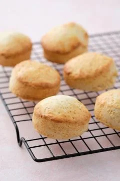 Scones with raspberry jam and clotted cream. Stock Photos