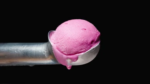 A scoop of pink ice cream in a specializ, Stock Video