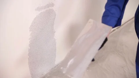 Scoop up the plaster with a spatula Stock-Footage 73395530