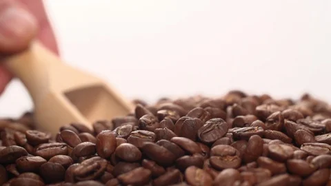 Scoop takes Coffee Beans Slow motion Closeup Macro shot Stock Footage 111801071