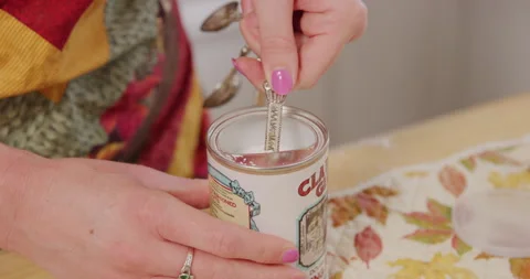Scooping baking powder from container into scoop Video stock 249316535