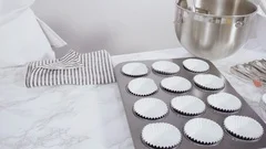 https://images.pond5.com/scooping-batter-batter-scooper-cupcake-footage-124710634_iconm.jpeg