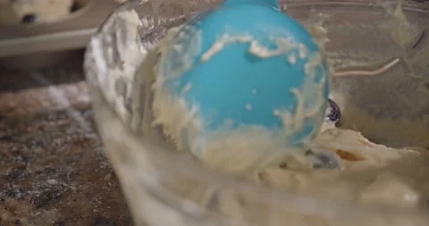 Scooping blueberry batter Stock Footage 149944957
