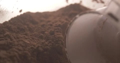 Scooping of cocoa chocolate powder macro shot Stock Footage 285465096