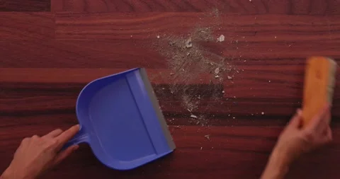 Scooping dirt into a dustpan 3 Stock Footage 132220369