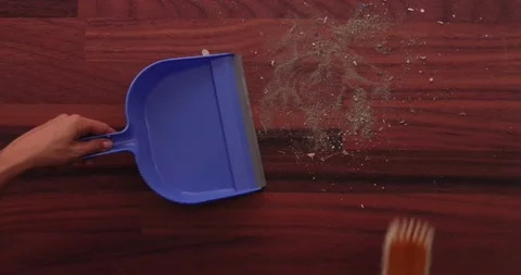 Scooping dirt into a dustpan 4 스톡 동영상 132220425