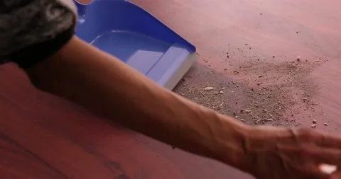 Scooping dirt into a dustpan 6 Video stock 132220419