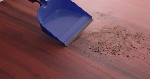 Scooping dirt into a dustpan 7 Video stock 132220475