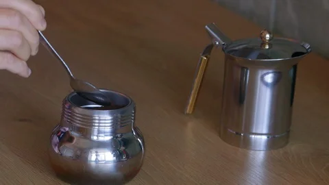 Scooping ground coffee and put in Moka pot filter. 스톡 동영상 129526286