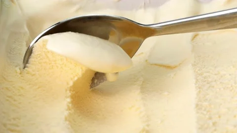 Scooping ice cream Vanilla. Stock Footage 142036896