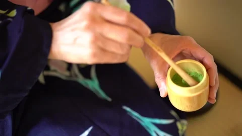 Scooping Matcha with a bamboo spoon. Stock Footage 131244759
