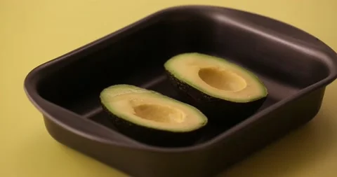 Scooping out the avocado 2 Stock Footage 132149662