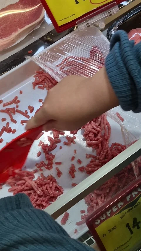 Scooping out ground beef Stock Footage 326706129