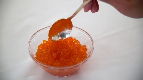 Scooping Red Caviar 1 Stock Footage 77329623