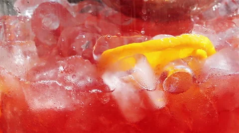 Scooping red drink with lemon and ice. Stock Footage
