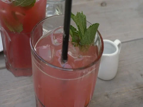 Scooping red drink with lemon and ice. Stock Footage 75878556