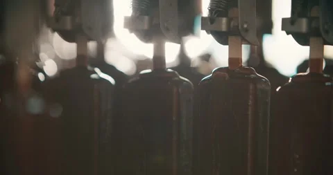 Scoops of chocolate ice cream through the rays of the sun. Ice cream production Stock Footage 256131026