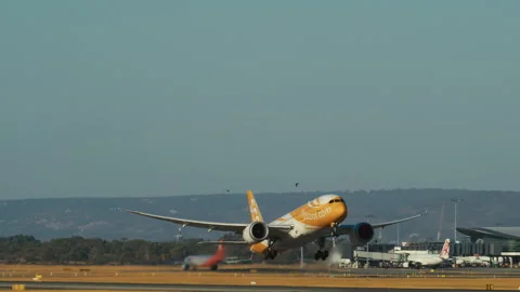 Scoot Boeing 787 take off, side view Stock Footage 308987259
