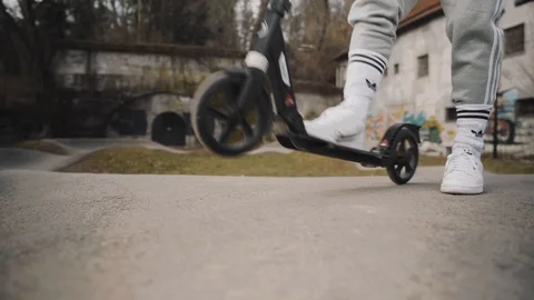 Scooter on back wheel on pump track Stock Footage 105217652