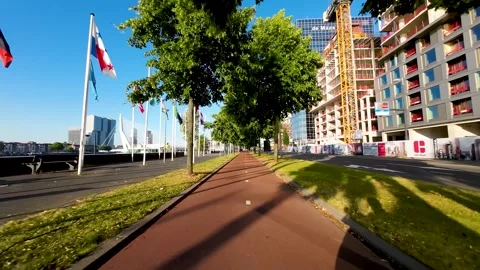 Scooter driving at an Empty Typical Dutch Bike Lane in 4K Stock Footage 245636919