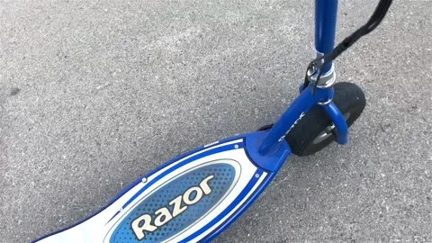 Scooter on the Ground Close-Up Video stock 244195688