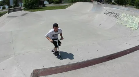 Scooter kid does a scooter flip angle 2 Stock Footage 8959280