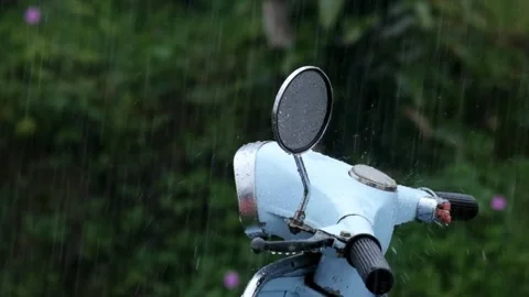 Scooter motorcycle handlebars caught in the rain Stock Footage 319888070