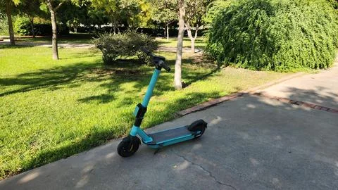 A scooter in a park Stock Photos