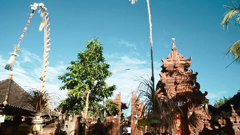 Scooter parked at balinese ornament and temple Stock Footage