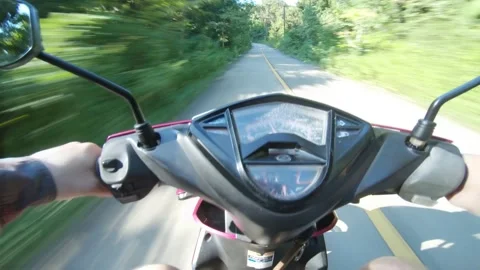 Scooter ride bumpy fast through jungle road POV Thailand Stock Footage 142529188
