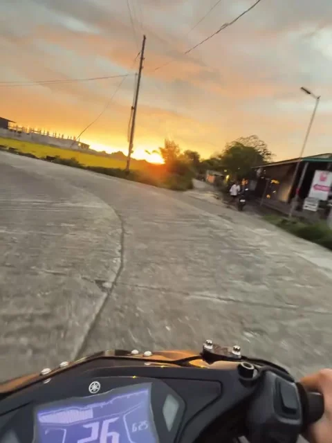 Scooter Ride Through Sunset Road Stock Footage 341317682