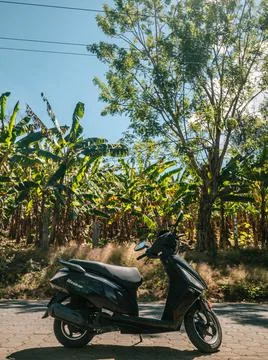 Scooter on the road Stock Photos