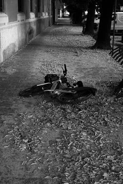 Scooter on the sidewalk Stock Photos