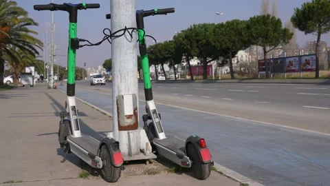 Scooter standing beside of the road Stock Footage 170057558