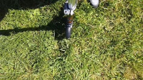 Scooter Wheel On Grass Stock Footage 127256957