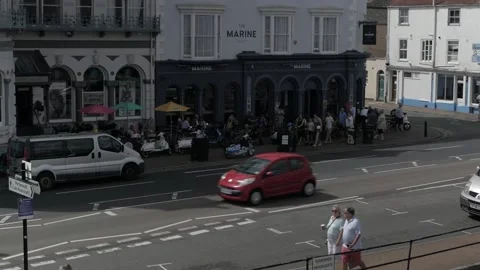 Scooterists along Ryde seafront, IW Scooter Rally 2022 Stock Footage 238444947