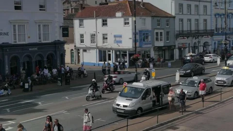 Scooterists on Ryde seafront, Isle of Wight Scooter Rally 2022, UK Stock Footage 238703554