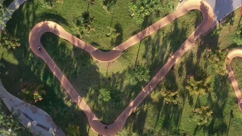 Scooters and bicycles path in the park Stock Footage 168082874