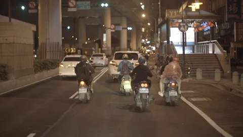 Scooters taking off at traffic light and driving Stock Footage 85812656