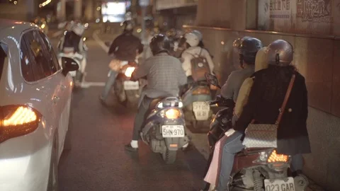 Scooters waiting in front of a traffic light Stock Footage 85812641