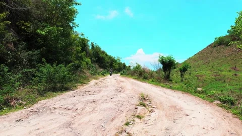 SCOOTING OFF ROAD Stock Footage 221302869